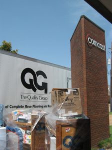 Commercial moving company, The Quality Group, working with comcast