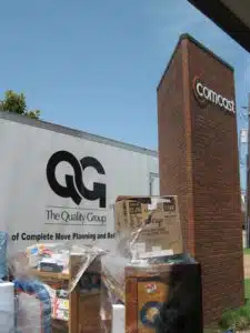 Commercial moving company, The Quality Group, working with comcast